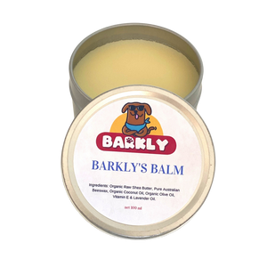 Open tin of Organic Dog Balm showing texture